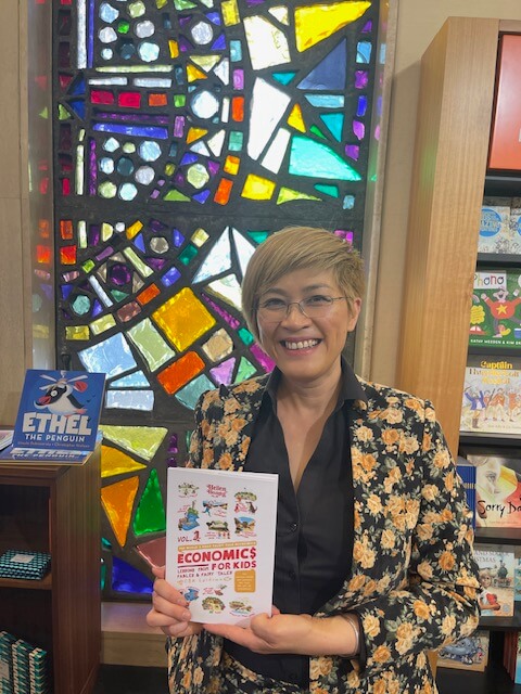 Helen with her book inside the National Library Bookshop