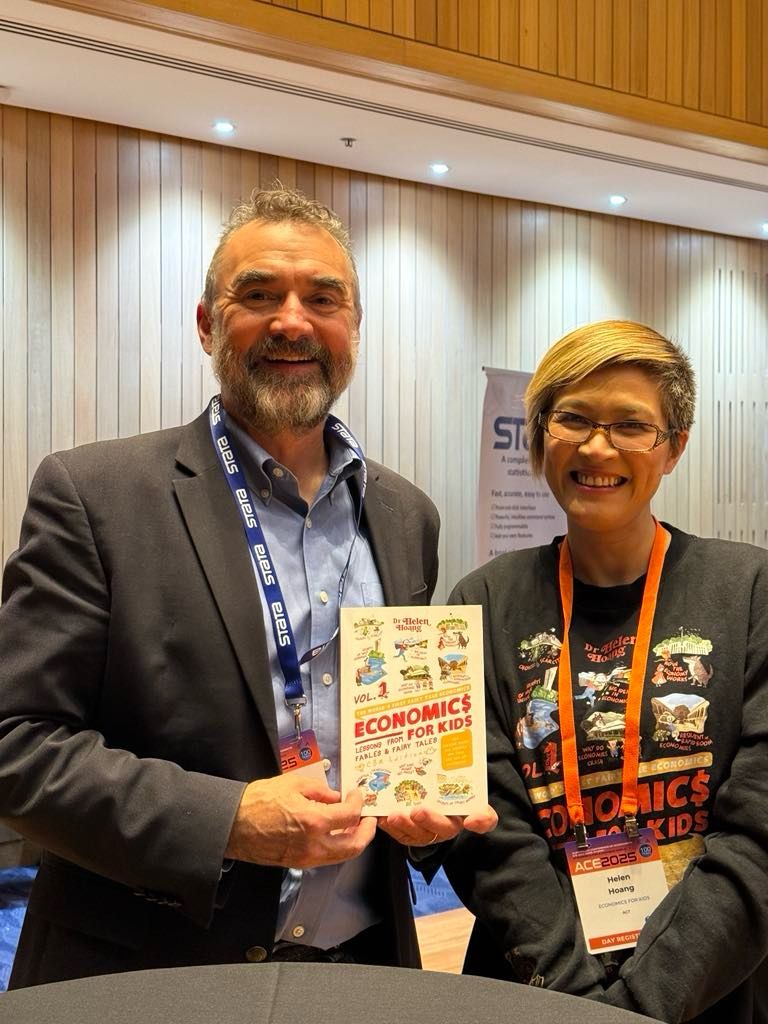 Dr. Helen Hoang with Prof. Robert Breunig